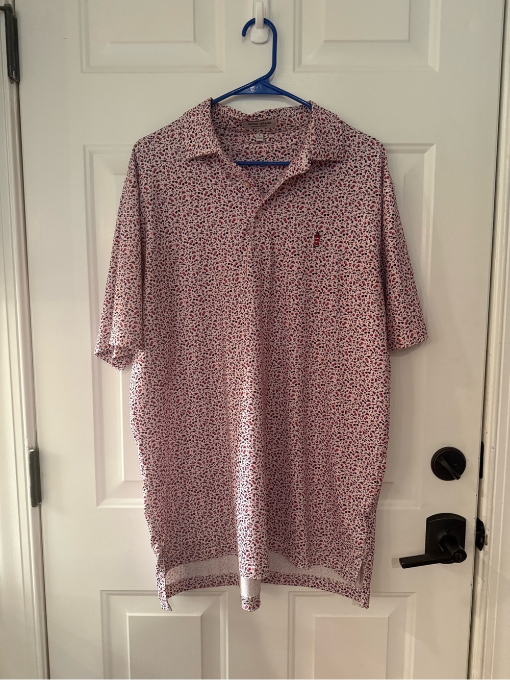 Peter Millar Men’s Summer Comfort Polo with Harbour town logo.